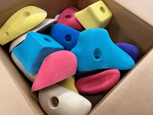 Mystery box of climbing holds. random rock climbing grips